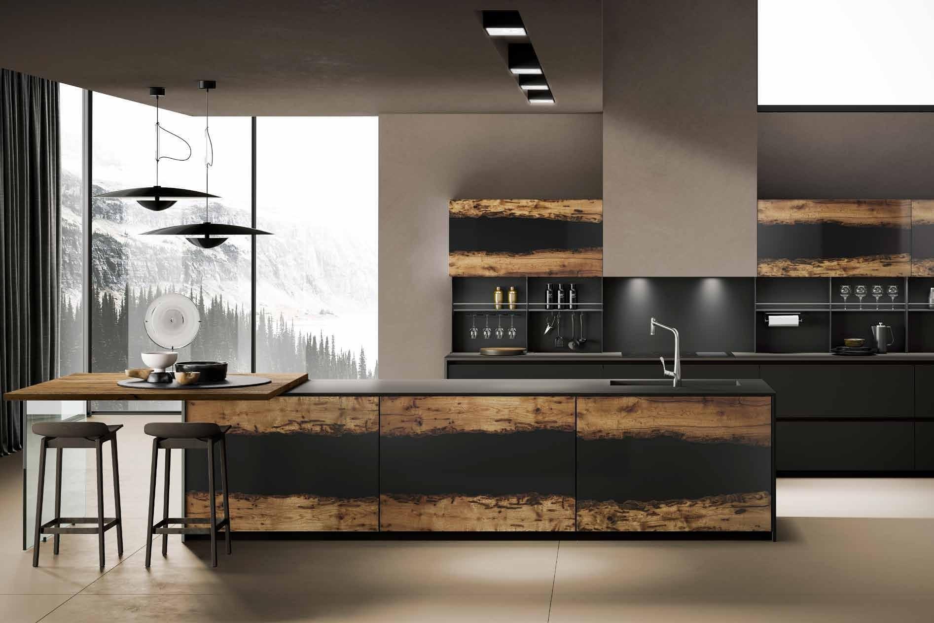 Detail of a Kiluxe kitchen: continuous recessed pull, marble worktop and brushed timber front